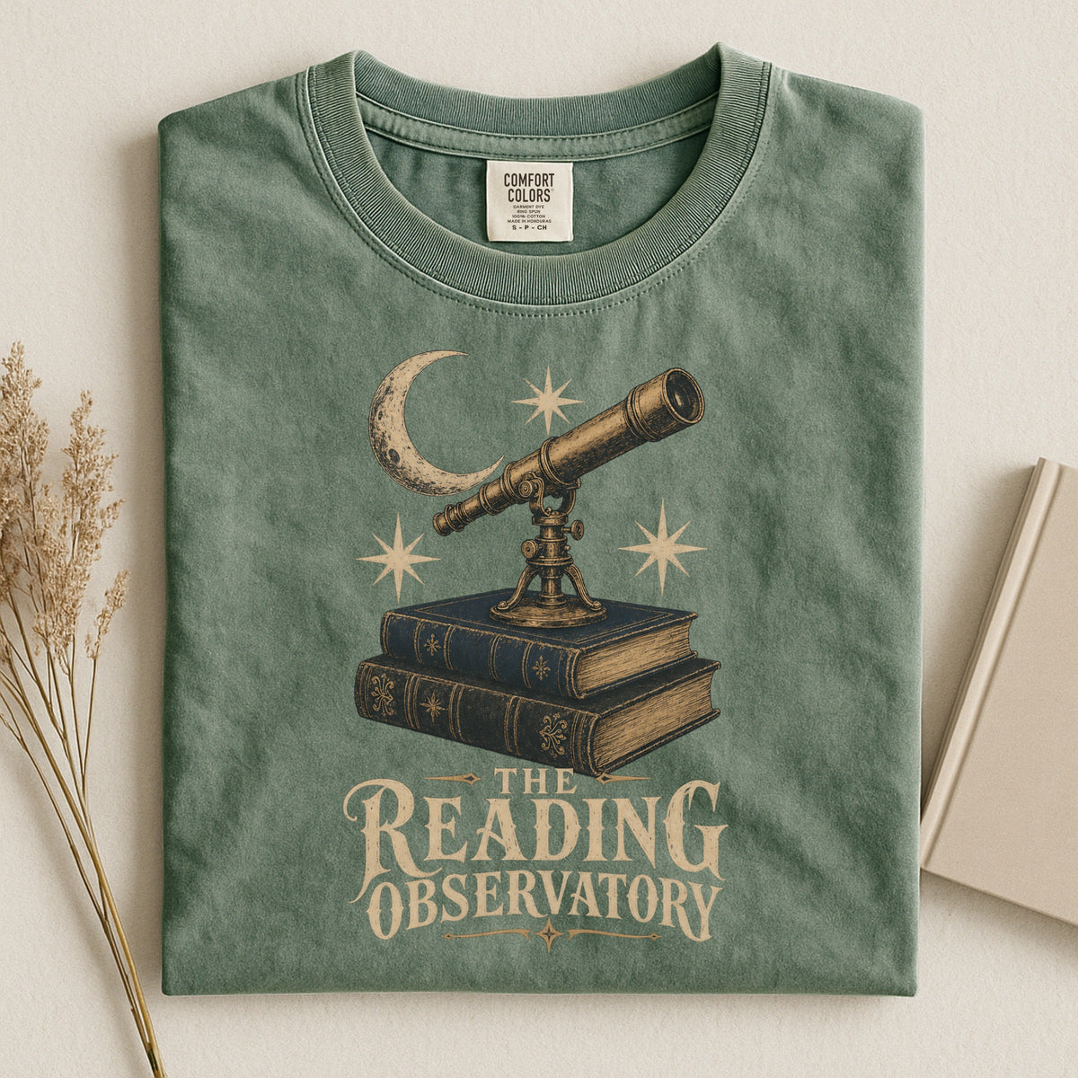 Shelf Love Studio The Reading Observatory t-shirt in Moss, styled flat lay