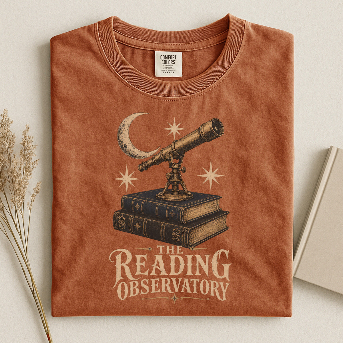 Shelf Love Studio The Reading Observatory t-shirt in Yam, styled flat lay