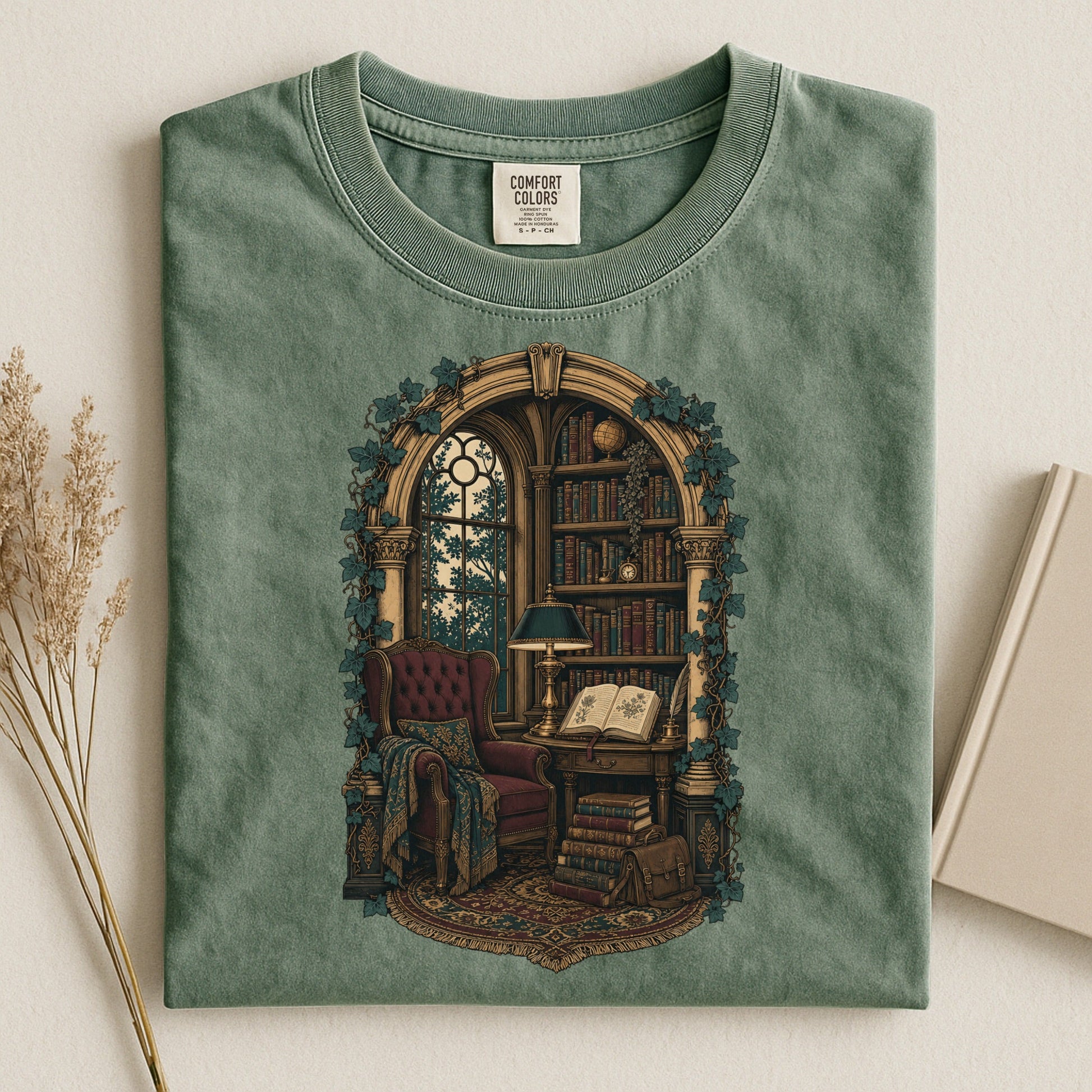The Reading Room bookish tee in Moss, flat lay