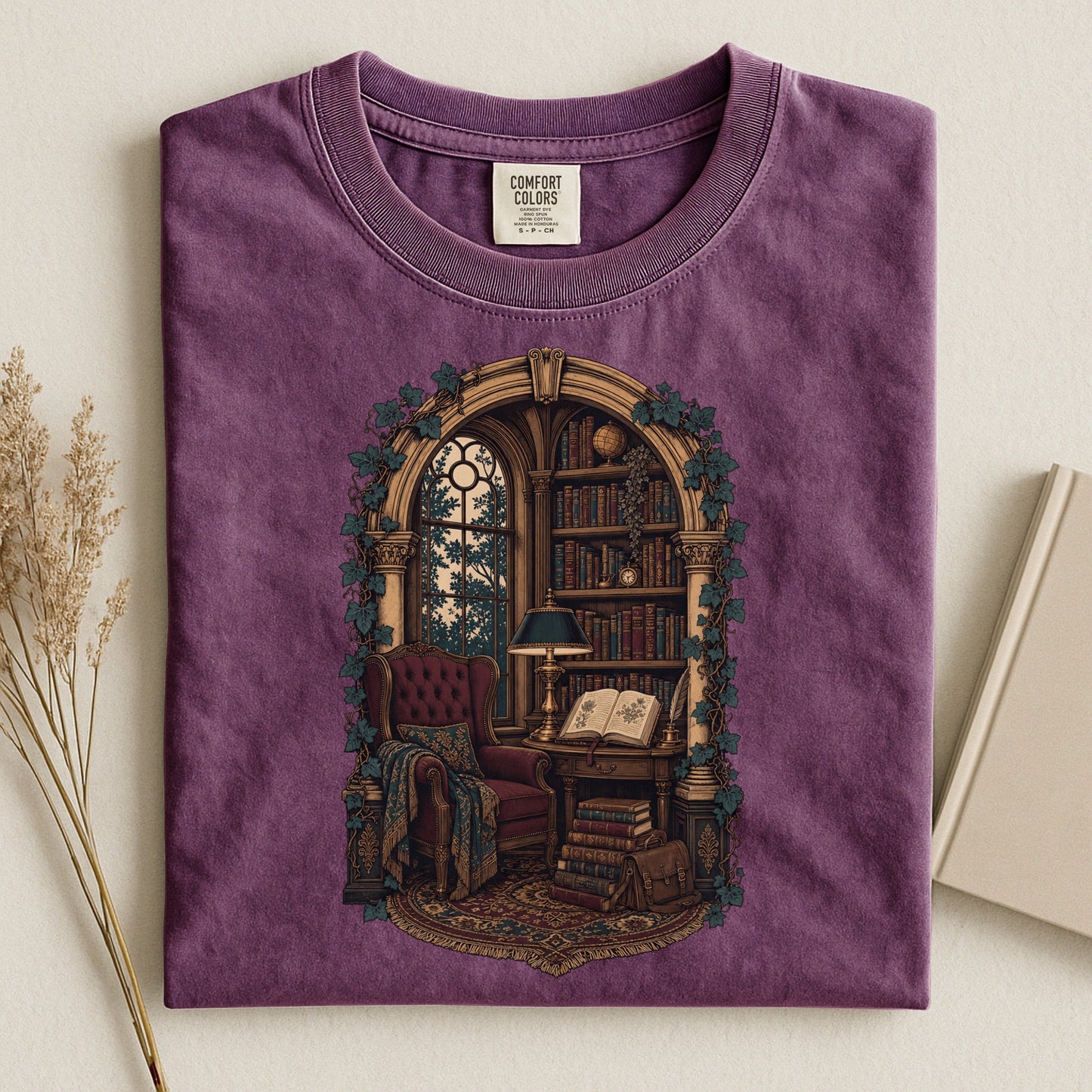 The Reading Room bookish tee in Berry, flat lay