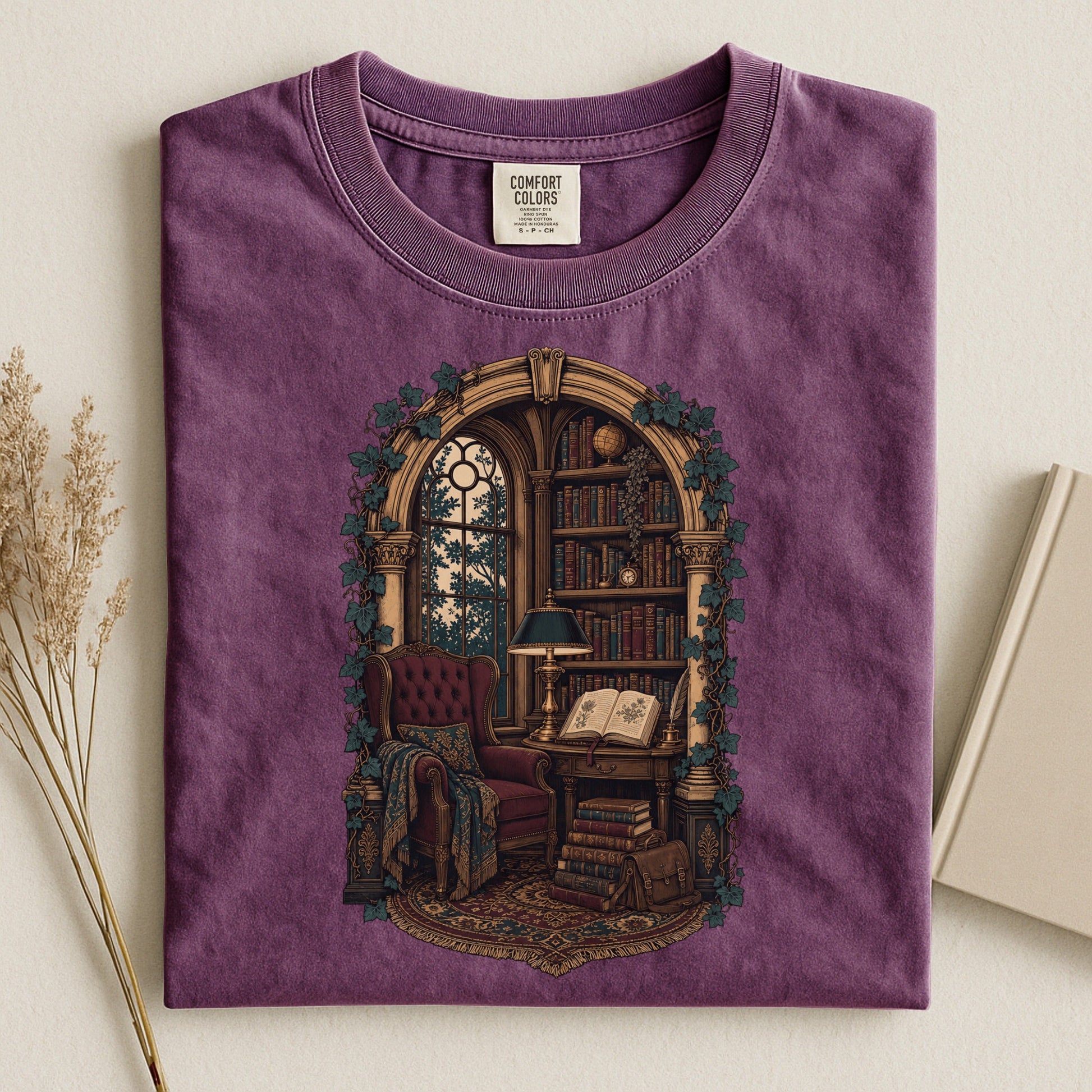The Reading Room bookish tee in Berry, flat lay