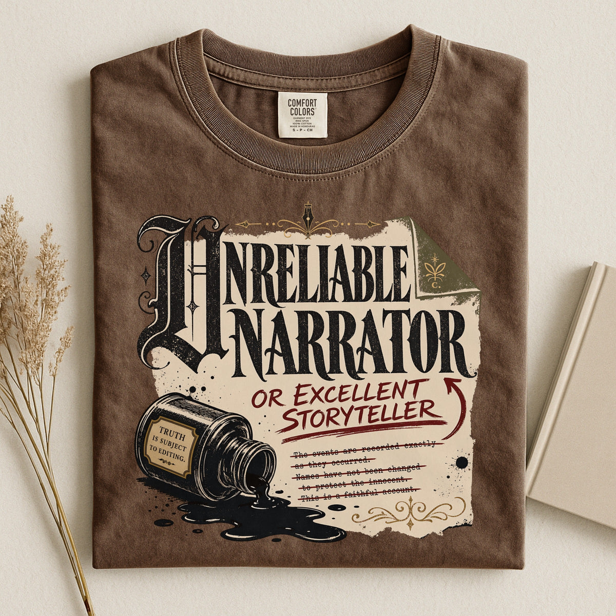 Shelf Love Studio Unreliable Narrator t-shirt in Espresso, styled flat lay