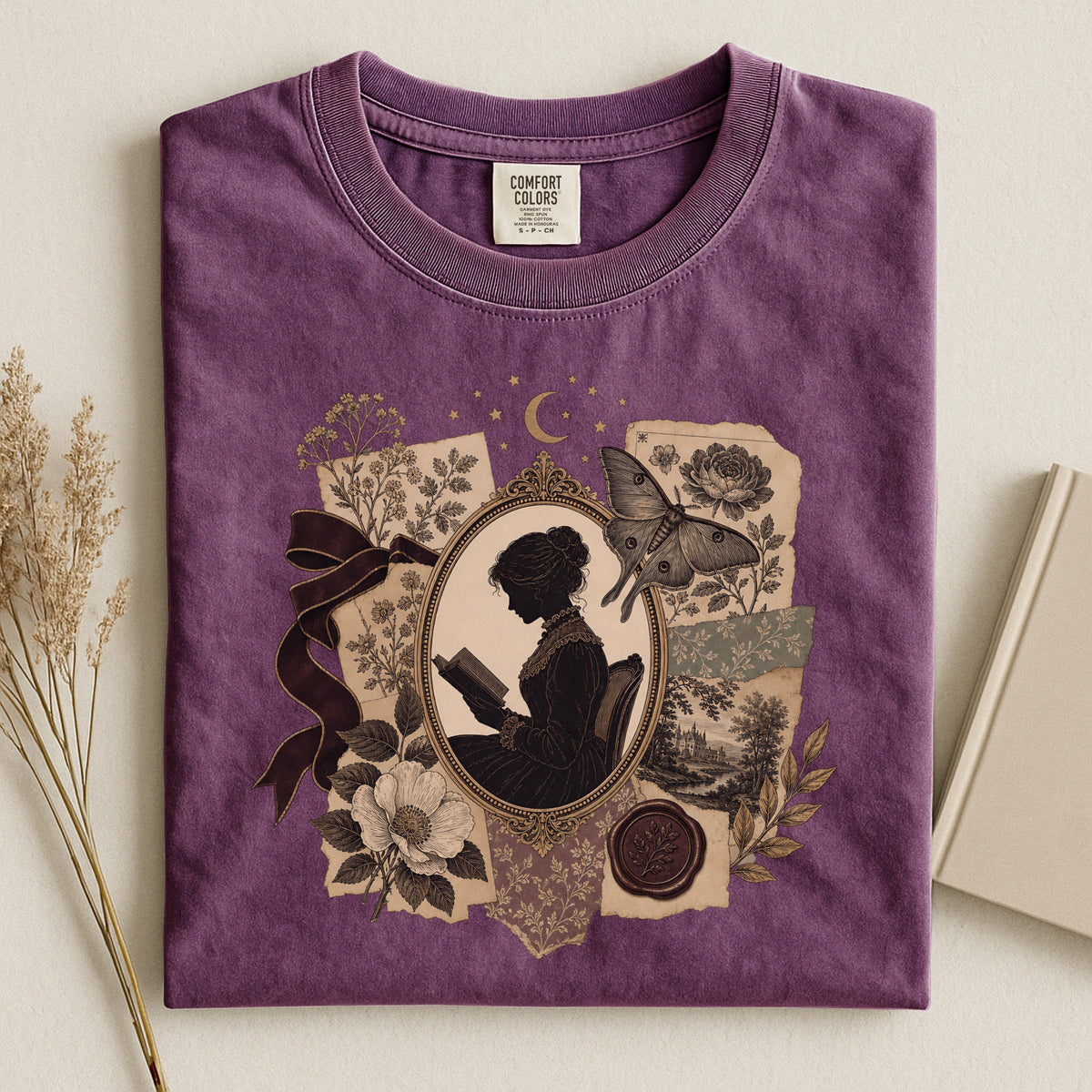 Shelf Love Studio Victorian Woman Reading t-shirt in Berry, styled flat lay