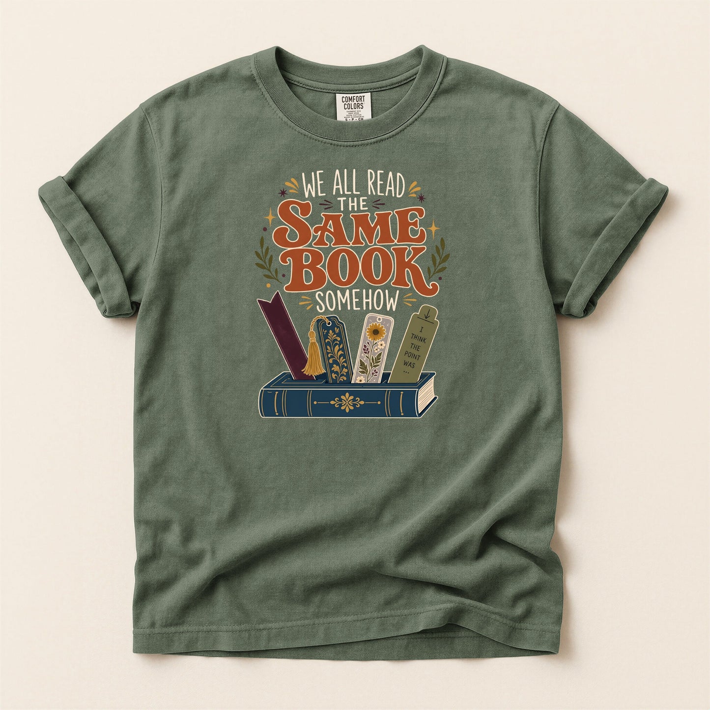 We All Read the Same Book Somehow bookish tee in Moss, full flat