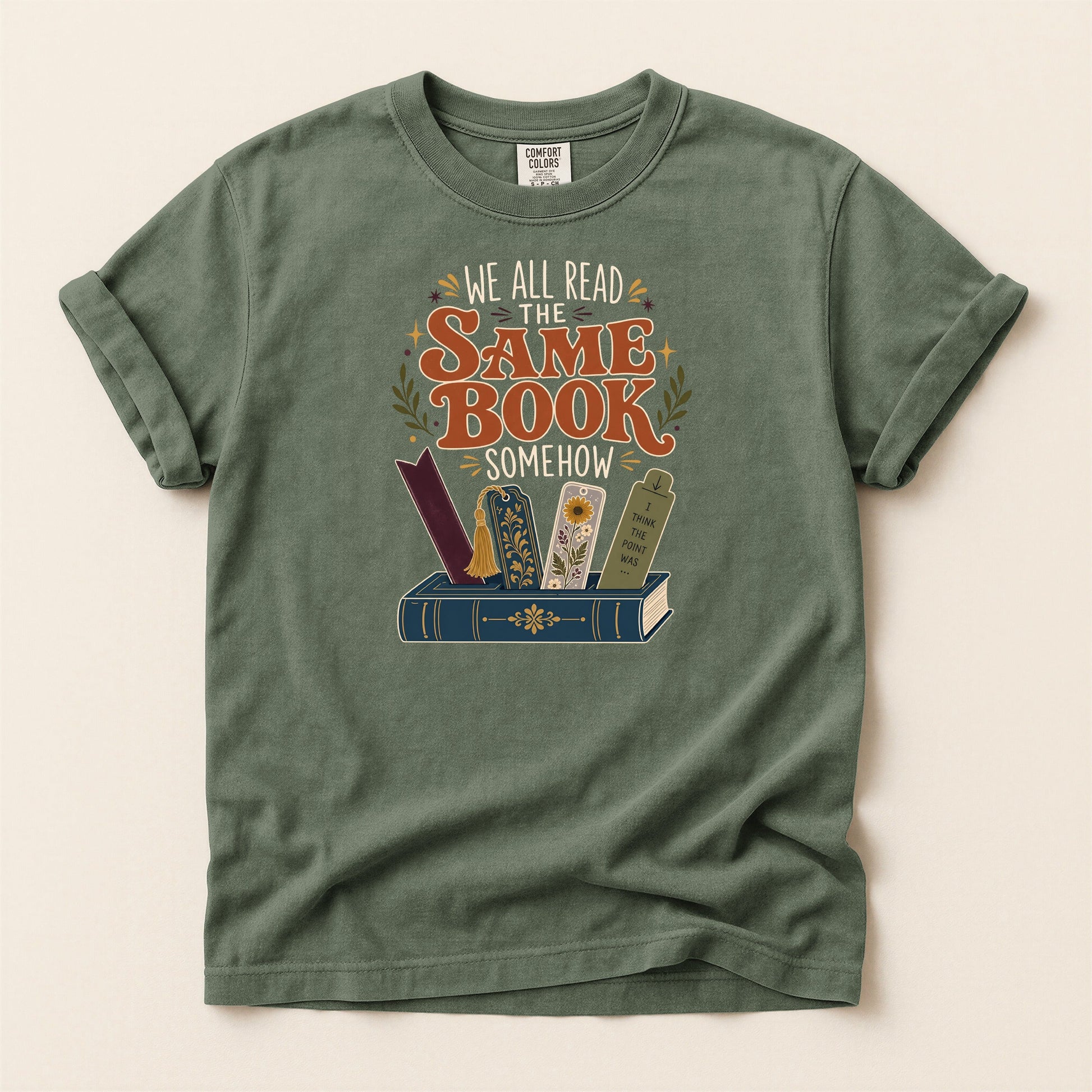 We All Read the Same Book Somehow bookish tee in Moss, full flat