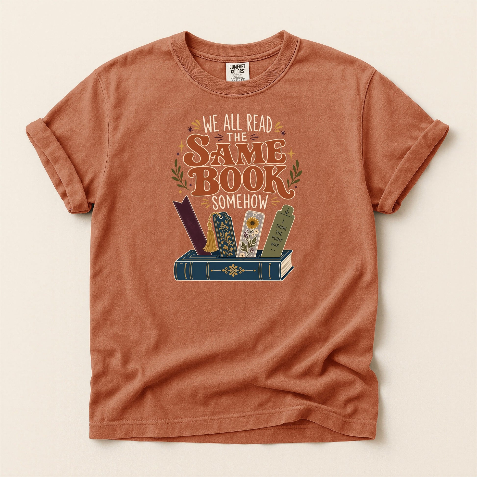 We All Read the Same Book Somehow bookish tee in Yam, full flat