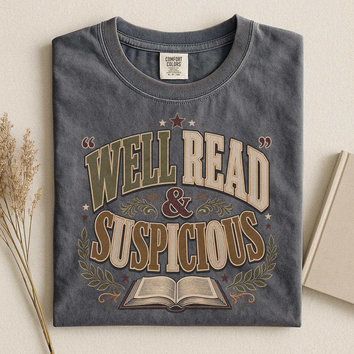Shelf Love Studio Well Read & Suspicious t-shirt in Pepper, styled flat lay