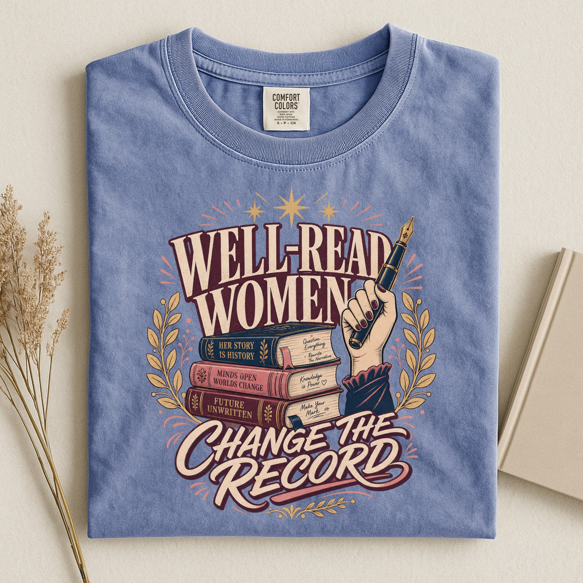Shelf Love Studio Well-Read Women Change the Record t-shirt in Blue Jean, styled flat lay