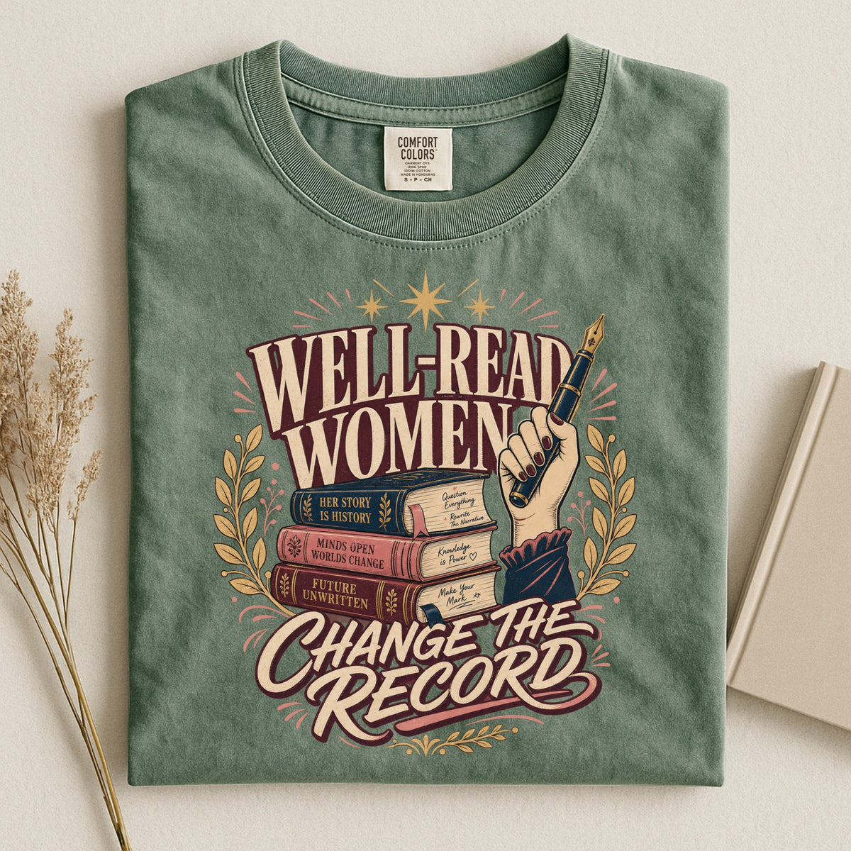 Shelf Love Studio Well-Read Women Change the Record t-shirt in Moss, styled flat lay