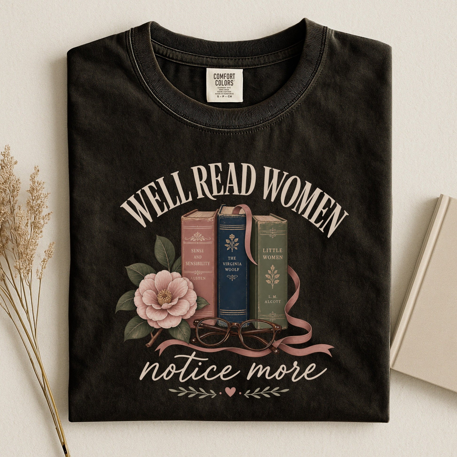 Well-Read Women Notice More bookish tee in Black, flat lay