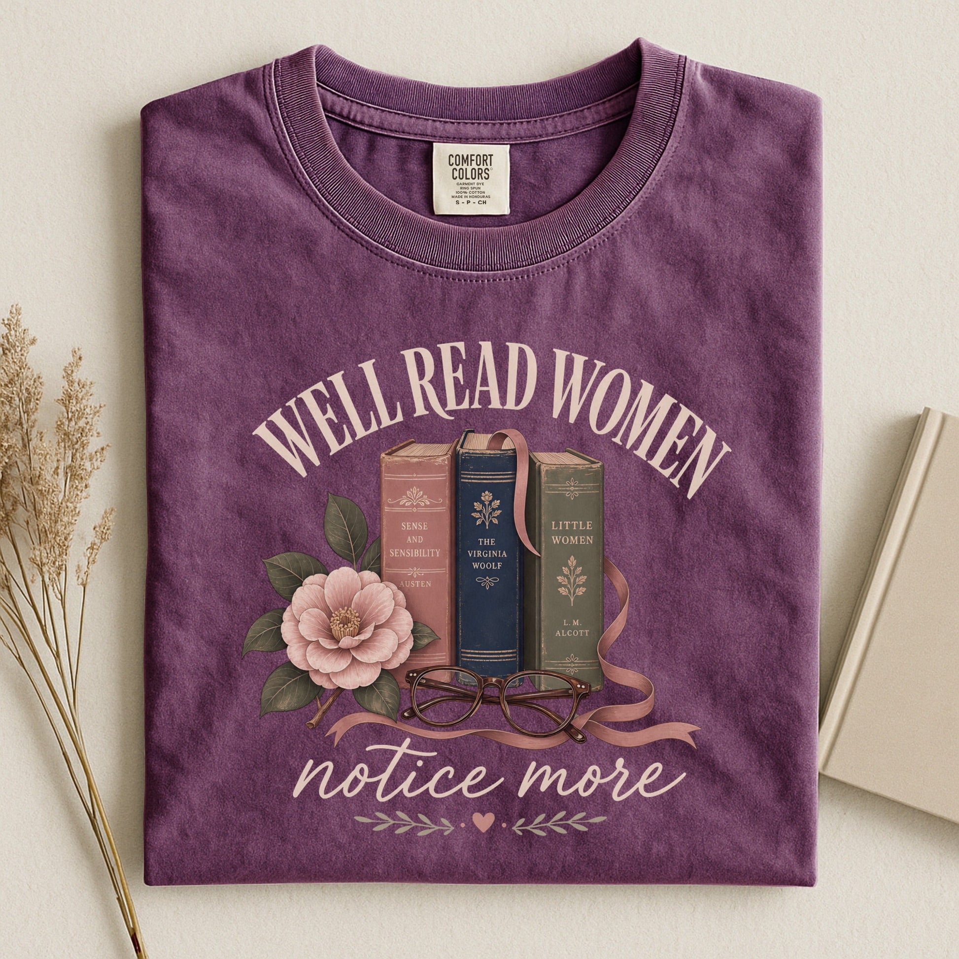Well-Read Women Notice More bookish tee in Berry, flat lay