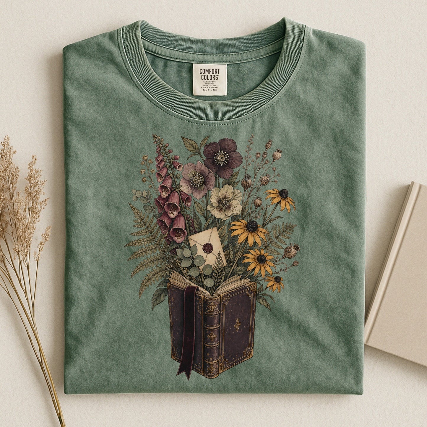 Wildflower Book Bouquet bookish tee in Moss, flat lay