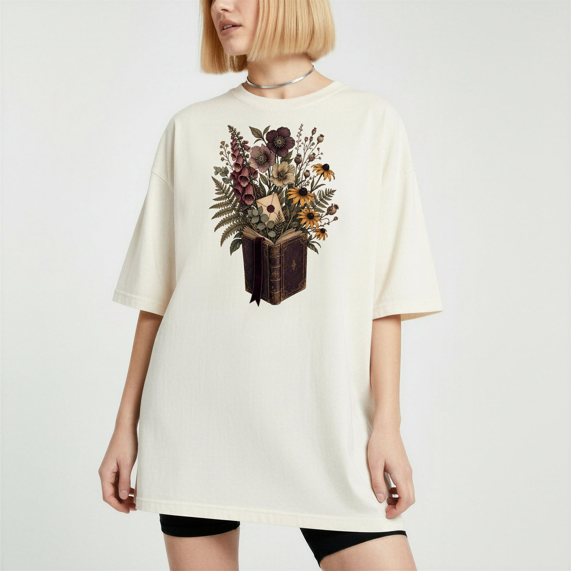 Wildflower Book Bouquet bookish tee in Ivory, worn