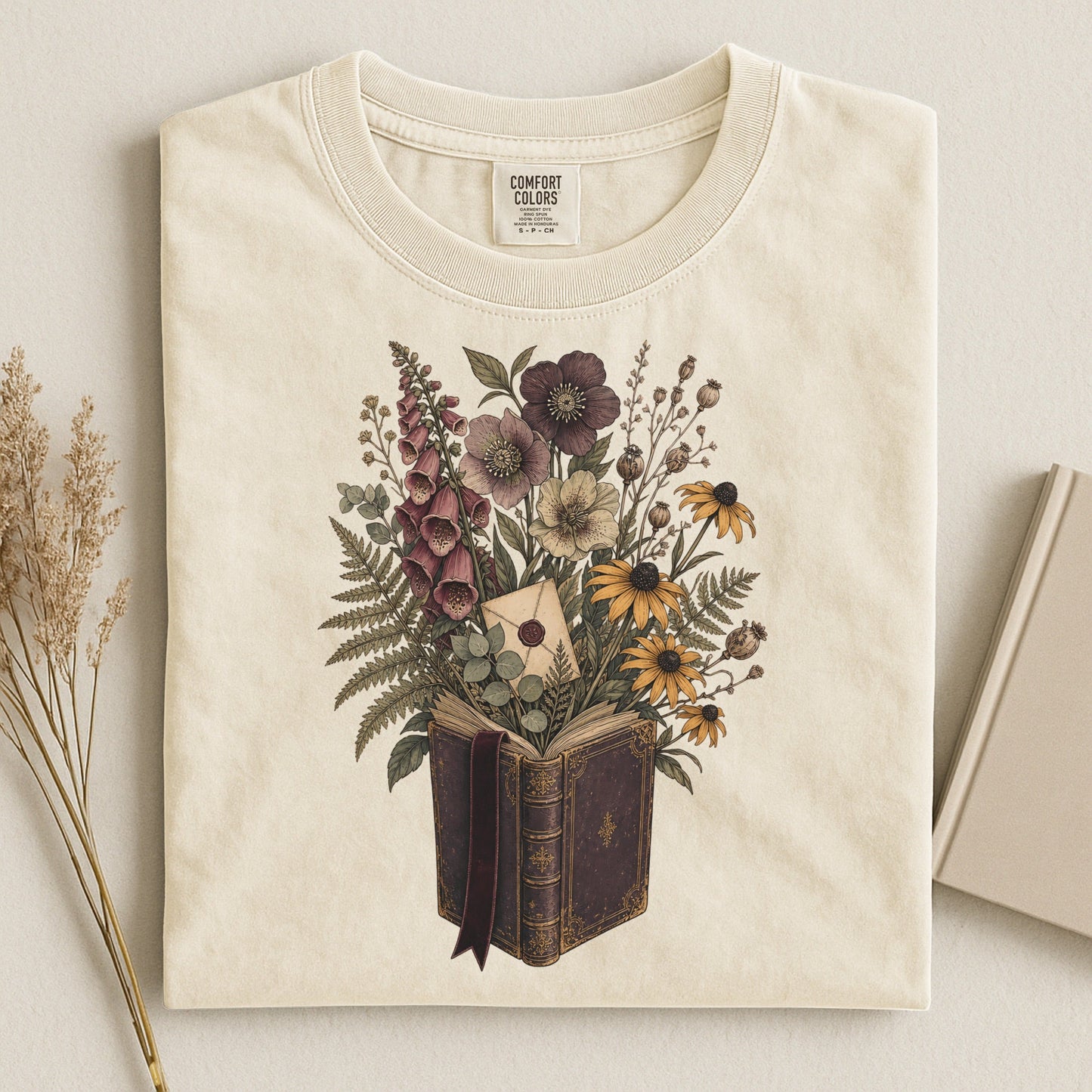 Wildflower Book Bouquet bookish tee in Ivory, flat lay