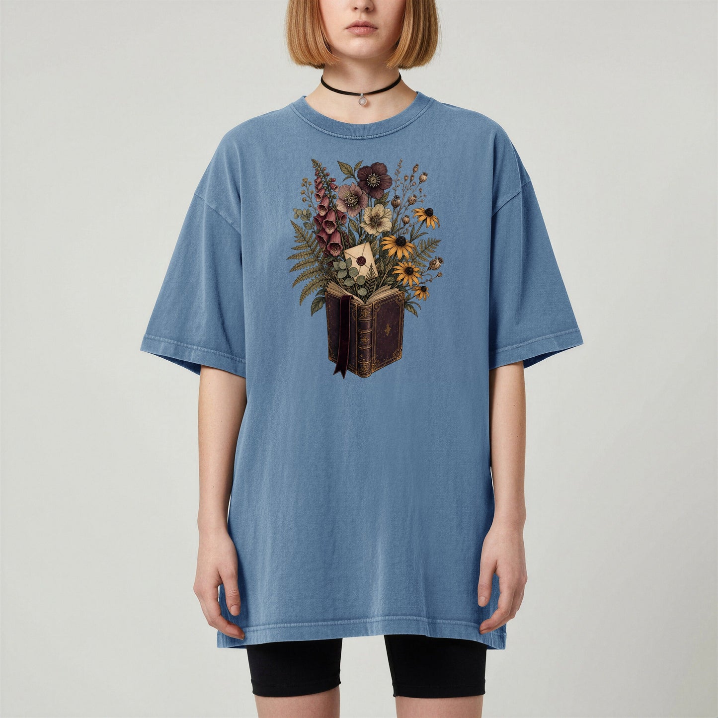 Wildflower Book Bouquet bookish tee in Blue Jean, worn