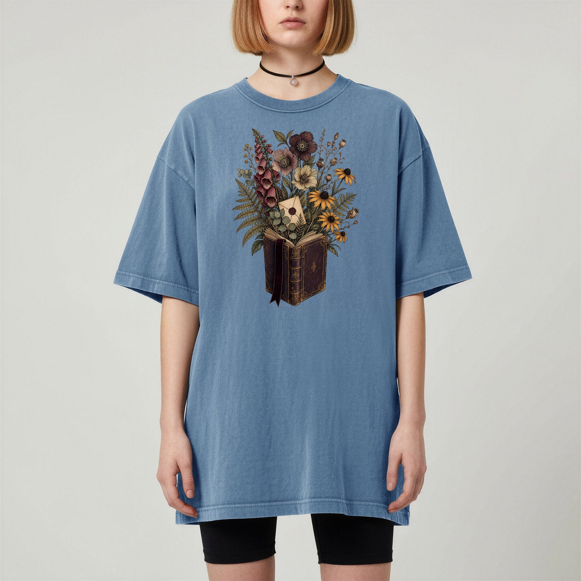 Wildflower Book Bouquet bookish tee in Blue Jean, worn