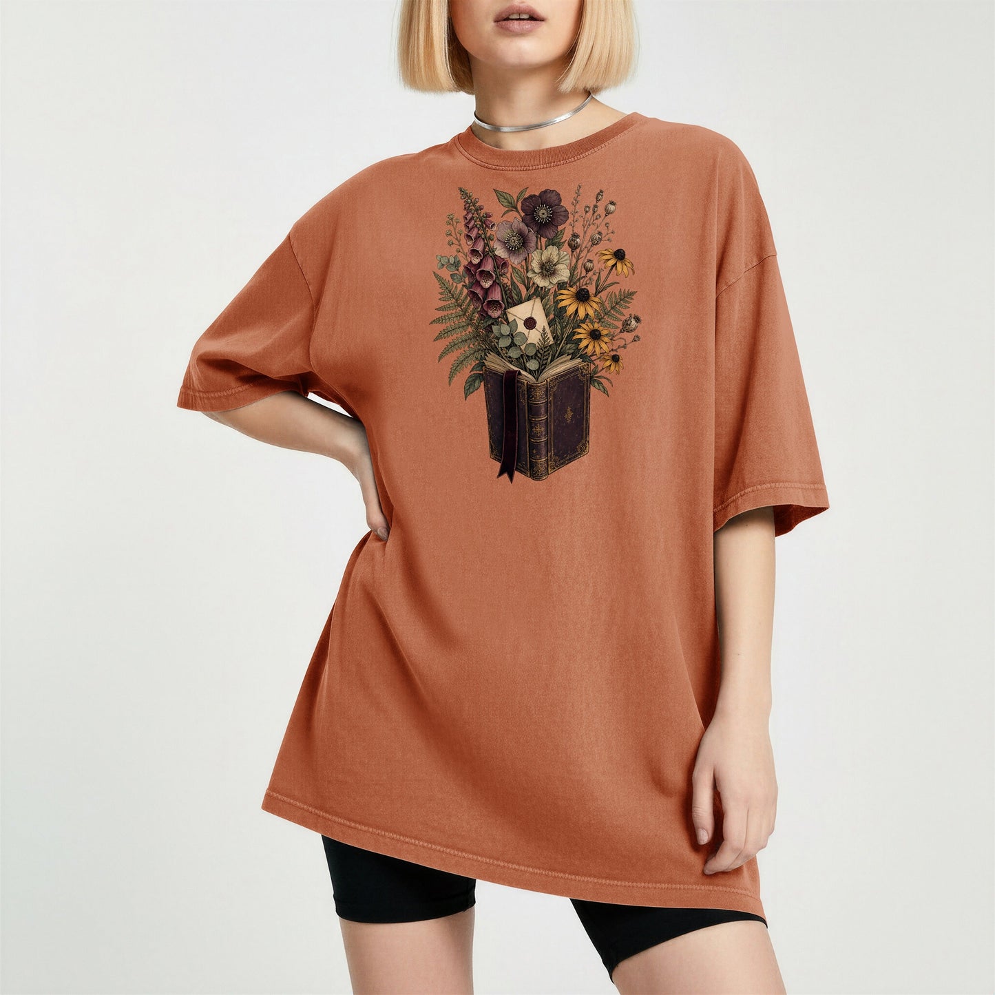 Wildflower Book Bouquet bookish tee in Yam, worn